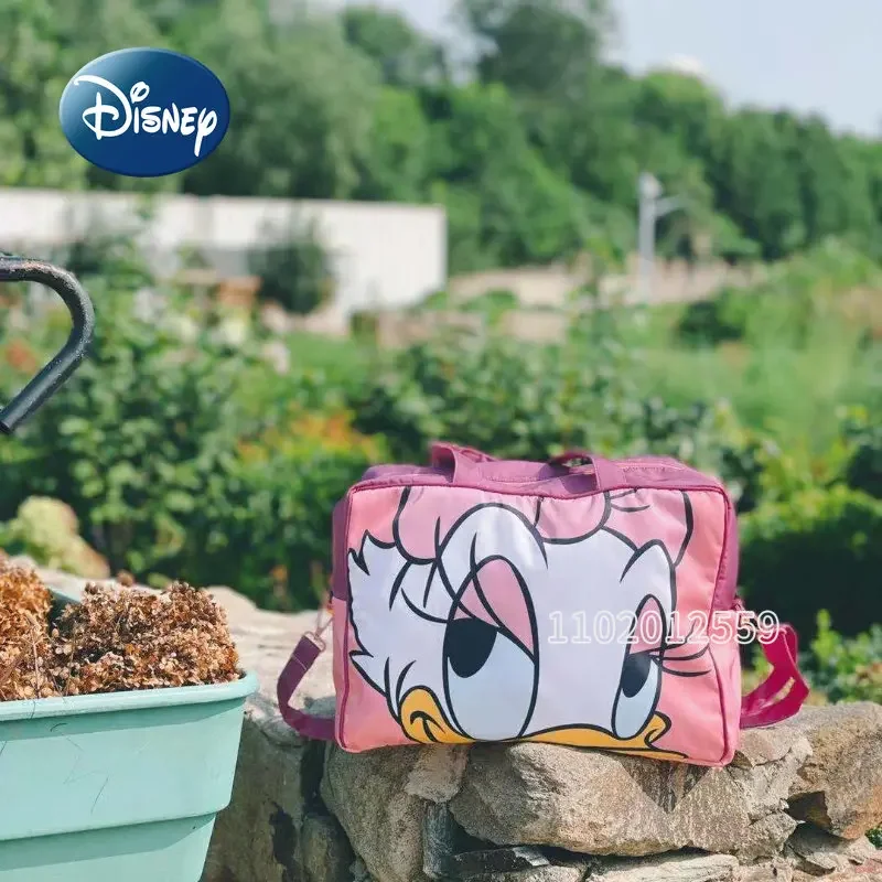 Фото Новая Женская дорожная сумка Disney «Дональд Дак», мультяшный портативный дорожный мешок, вместительная водонепроницаемая сумка для хранения №5