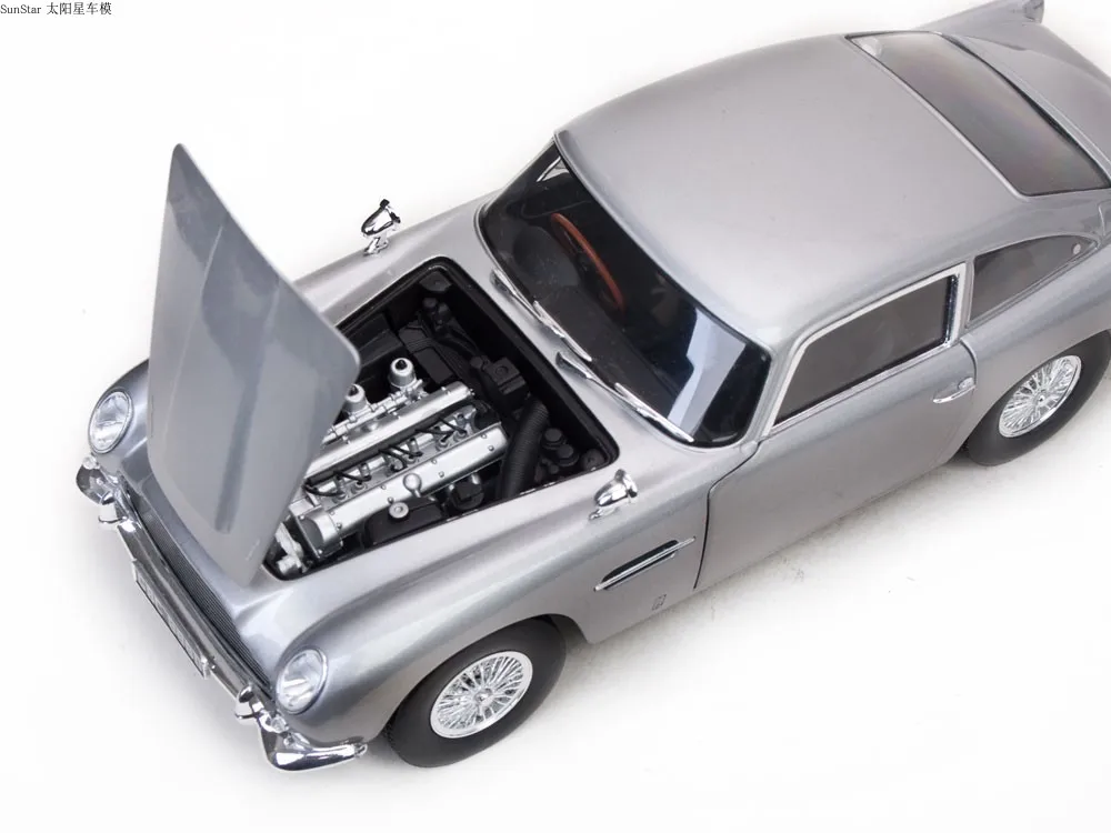 Классические автомобили ASTON MARTIN DB5 SunStar 1:18 1963 ограниченная серия металлическая