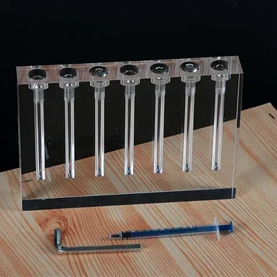 Автомобильный компаратор масла может переводить демонстрационную стойку из