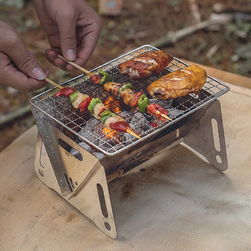 

New Outdoor Portable BBQ Camping Grill Folding Compact Stainless Steel Charcoal Barbeque Grill Detachable Bonfire Grill Stove