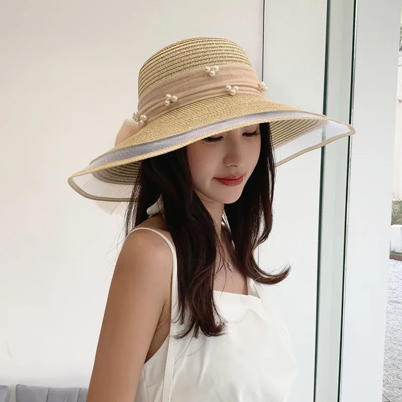 

Hat lady summer sun protection straw hat new pearl ribbon big bow fisherman hat beach holiday sun visor hat