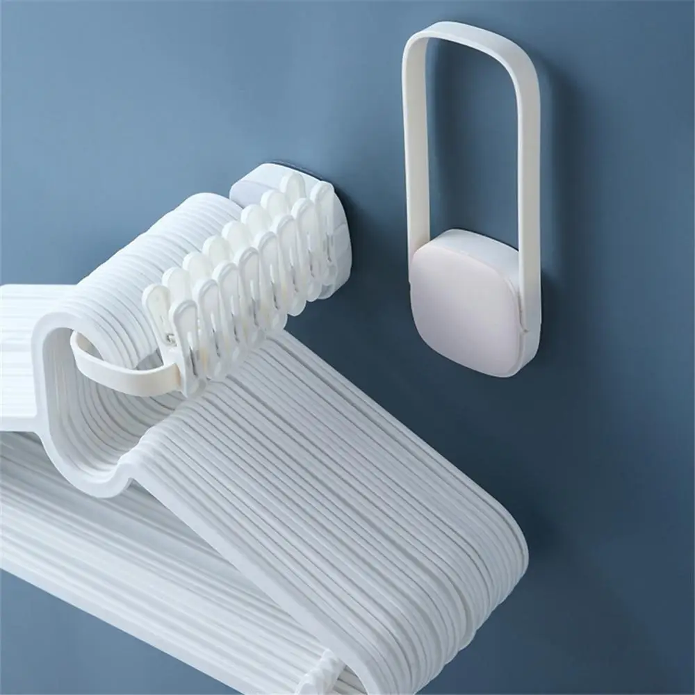 

Clothes Hanger Storage Rack Wall Mounted Folding Hanger Stacker Organizer Punch Free Space Saving Balcony Organzier