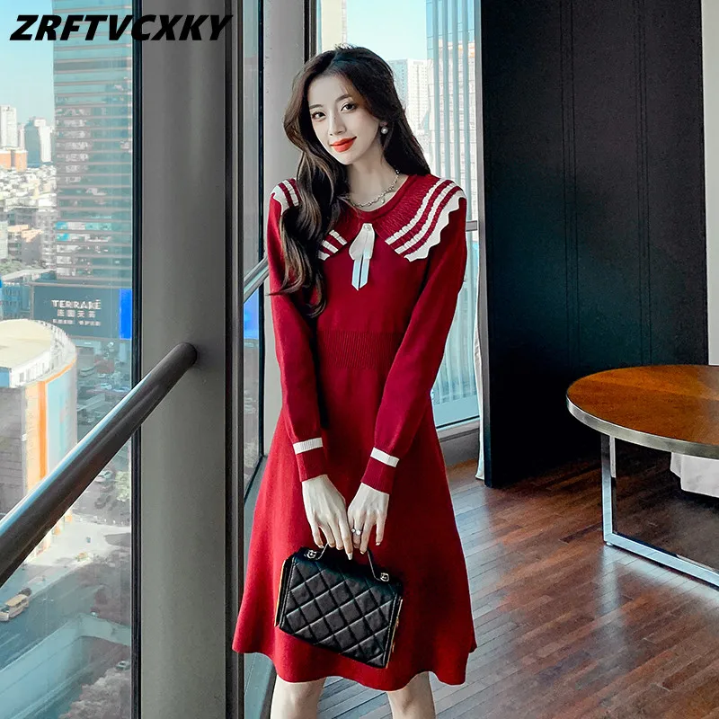 

Женское трикотажное платье-свитер средней длины, красное элегантное весеннее платье-свитер с длинным рукавом, бантом и жемчужными пуговица...