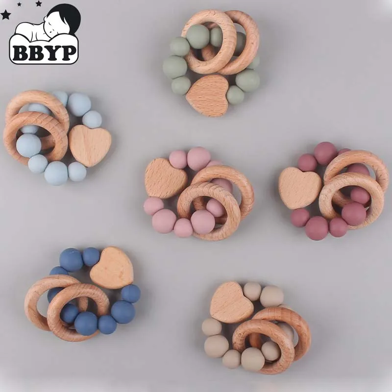 

5Pcs Baby Teether Bracelet Silicone Beech Beads Heart Ring Wood Rattles Fidget Toy for Baby Teething Nursing Toy Appease