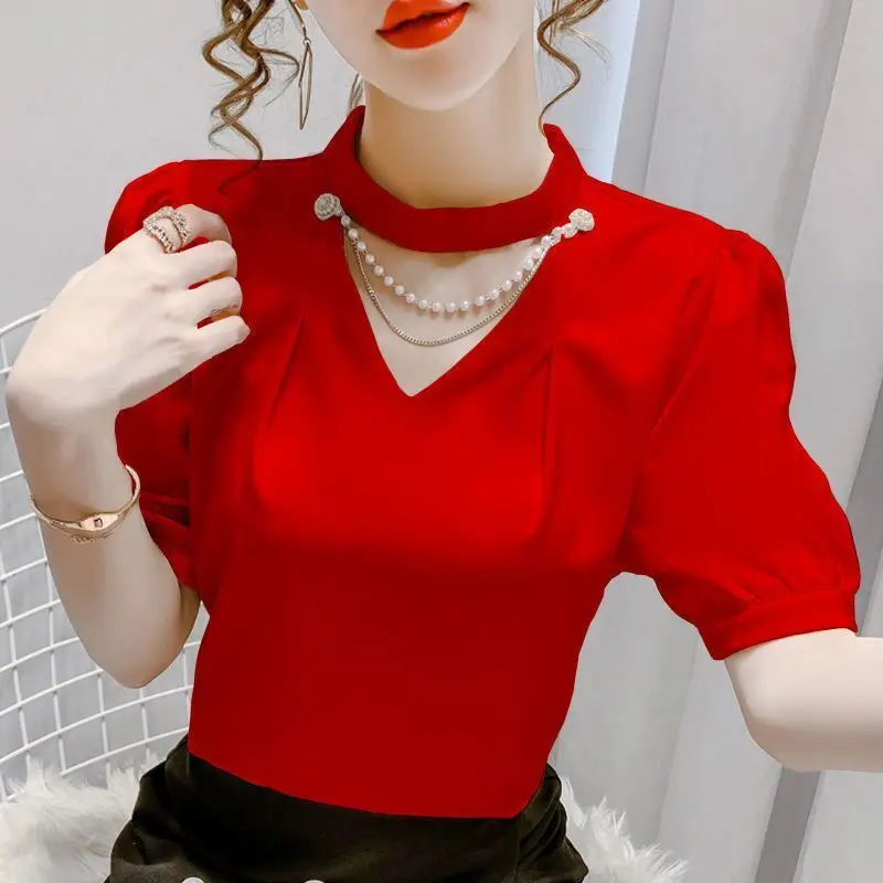 

WDMSNA Women Summer Blouses Women Fashion Casual Puff Short Sleeve Shirts Lady Stand Neck Solid Pearl Hollow Out Blouses Tops