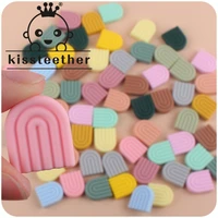 kissteether new creative diy baby products cartoon silicone solid color rainbow teether baby molar pacifier anti drop chain toy