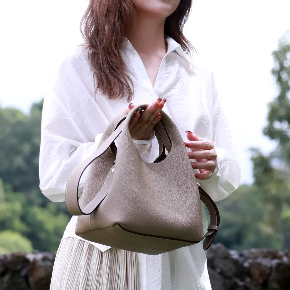 

2023 New Top Layer Cowhide Vegetable Basket Bag Women's One Shoulder Colored Bucket Bag Versatile Handheld Crossbody Style Bag
