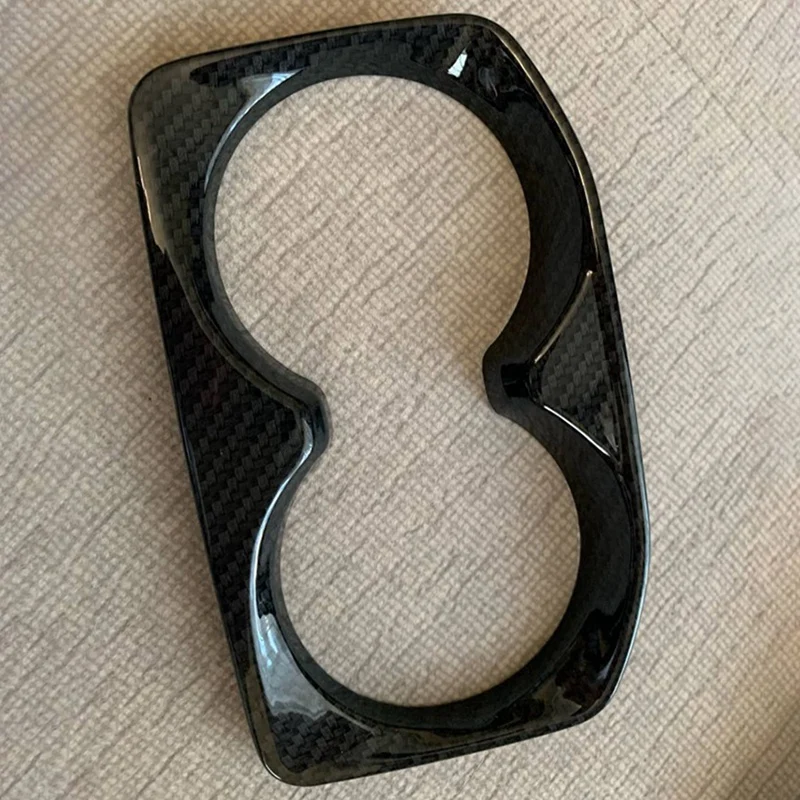 1 шт. наклейки на рамку держателя стакана для автомобиля и 2 шт. контейнера для хранения телефона на передних дверях автомобиля.