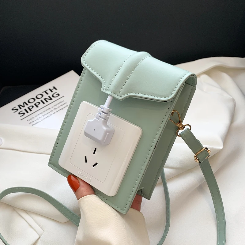 

Small design sense shoulder slung bag female 2022 new tide summer personality creative socket mobile phone bag small bag