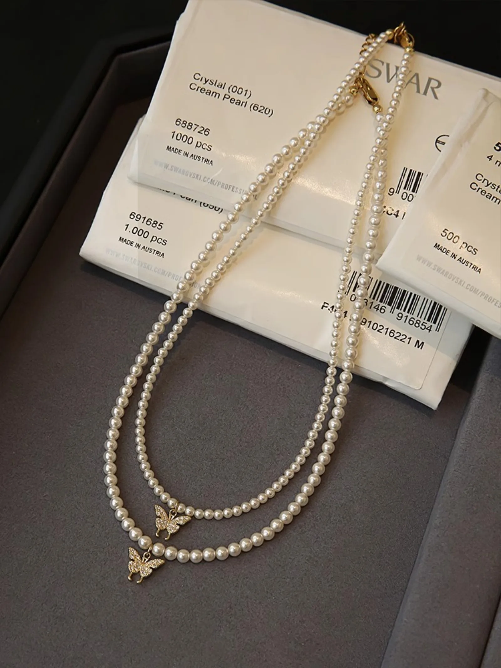 Серебряное ожерелье-бабочка с жемчужной цепочкой