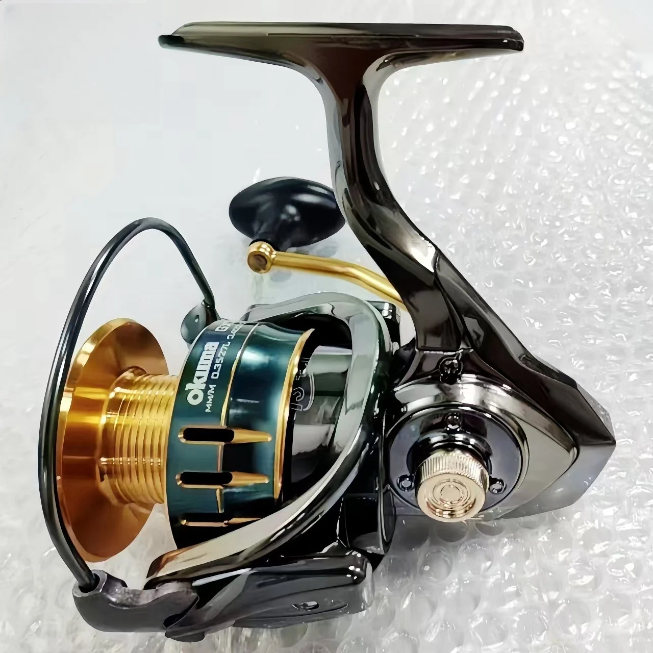 Спиннинговая катушка okuma