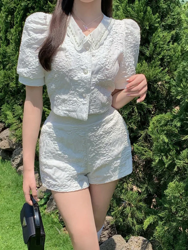 

Korean Fahsion Shorts Suits Women 2022 Summer Pearl Buttons Lapel Short Sleeve Crop Top And Wide Leg Shorts Two-Piece Set