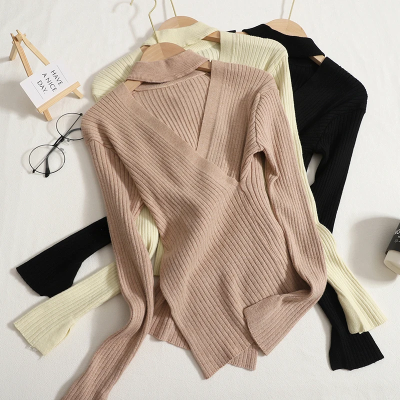 

Korean knitted sweaters tops women's autumn new halter neck hollow bottoming cross hem slit long-sleeved soft sweater Full