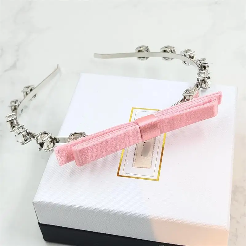 

Butterfly knot hair band with imitation crystal hollowed out fashionable and versatile brass electroplated hair accessories