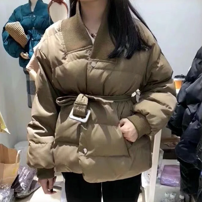 Fashionable Version of The V-neck Winter Waist Waist Waist Warmth Pure Color Wild Loose Belt Jacket Thickened Office Ladies