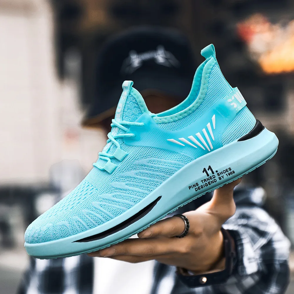 

2023 Men's Sports Shoes Casual Sports Shoes Comfortable Breathable Fabric Fashion Low Top Men's Shoes Spring and Autumn