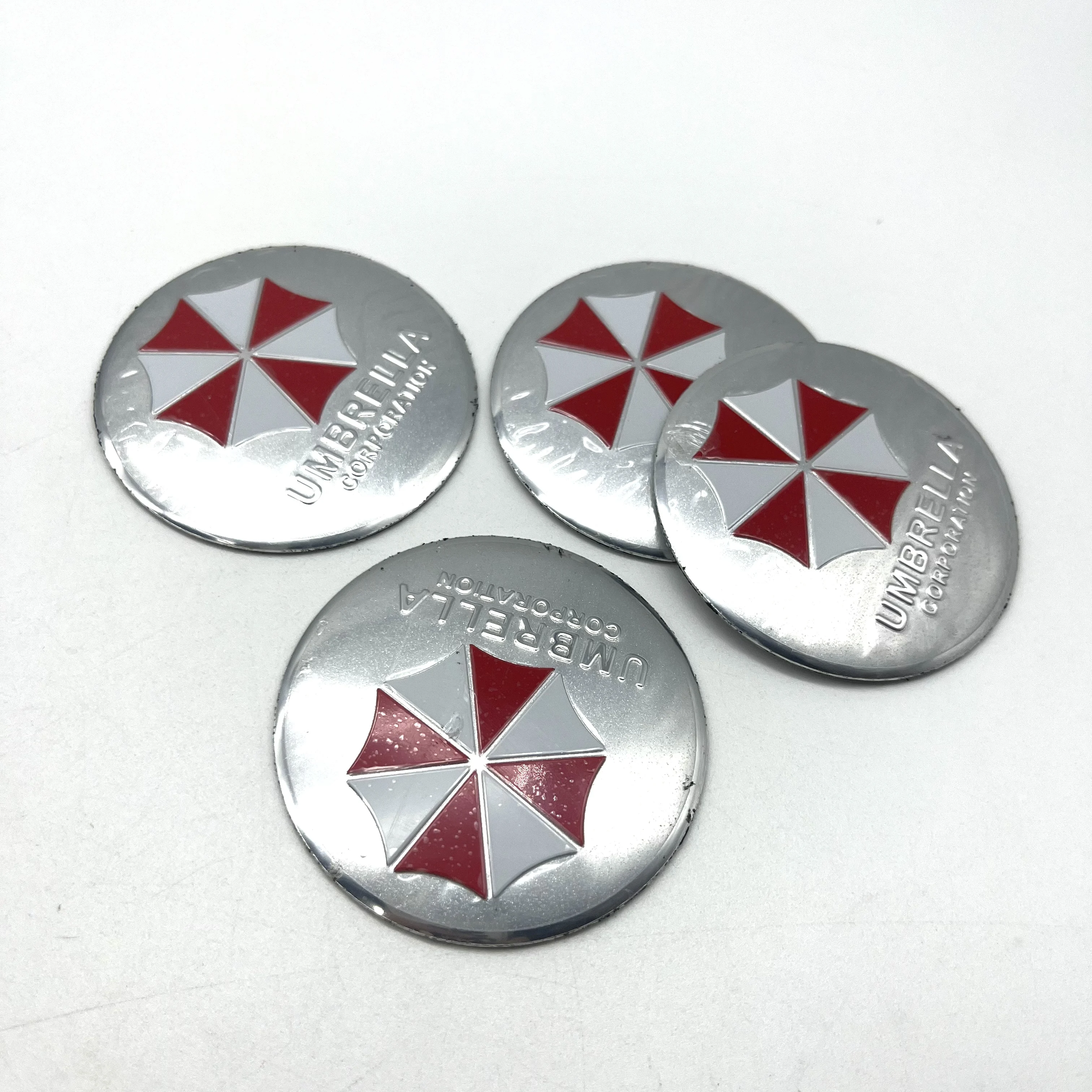 Фото Набор из 4 универсальных 3D-наклеек UMBRELLA CORPORATION (56 мм, 65 мм) для центральных колпачков автомобильных дисков, эмблемы, стайлинг-аксессуары №4
