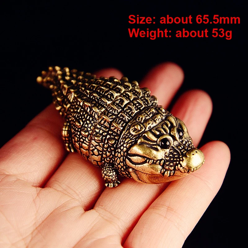 

Латунная статуэтка крокодила