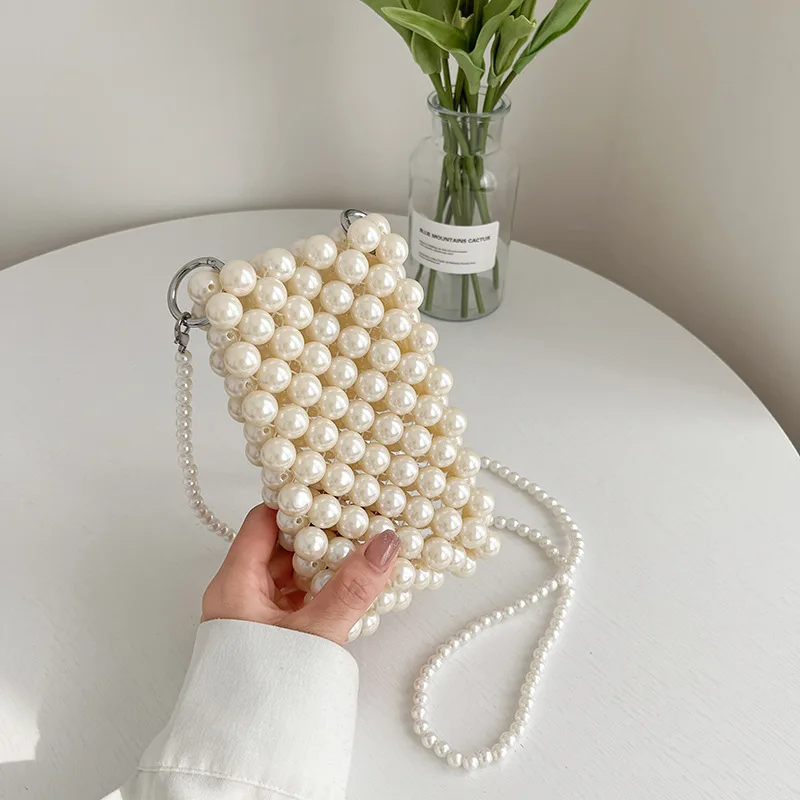 

The Popular Pearl Weaving Personality 2022 Spring New Texture Trend Single Shoulder Women's Bag Diagonal Cross Square Party Bag