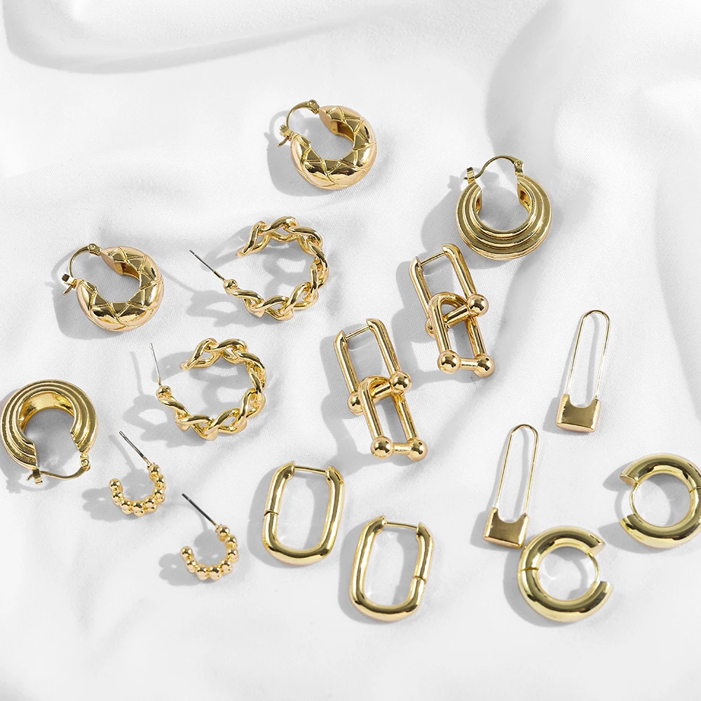 Женские объемные серьги-кольца круглые текстурированные обручи золотого цвета в