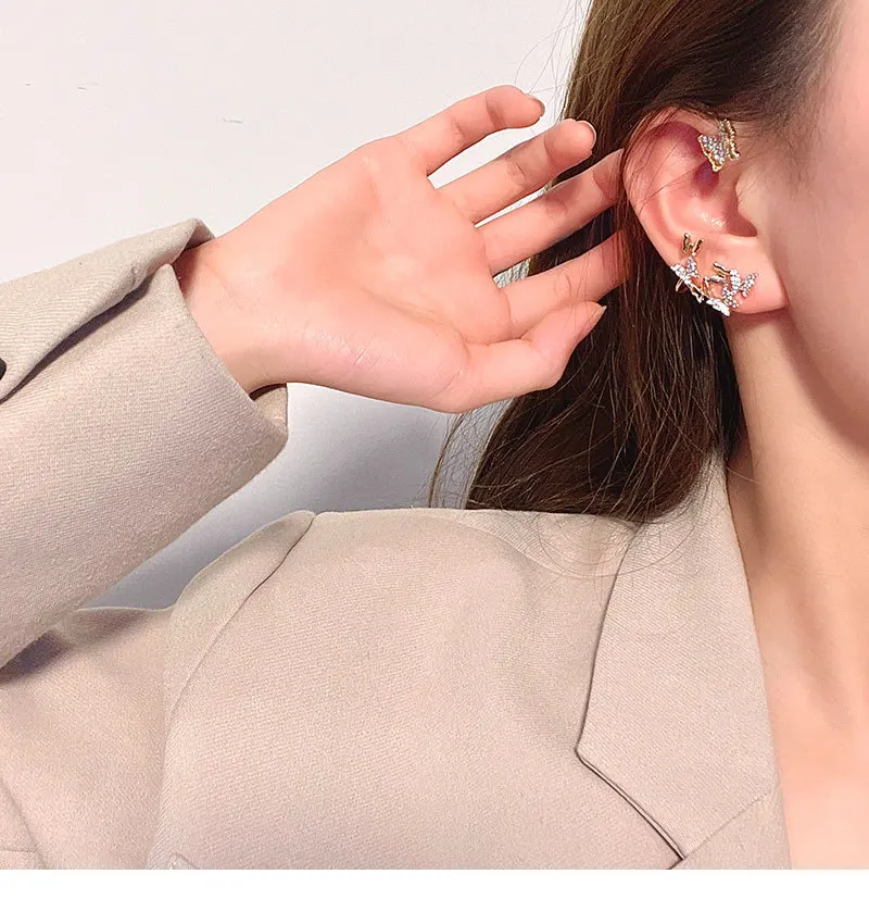 

Korean super fairy design earrings retro flash diamond bow one-piece ear hanging Sen temperament net red ear jewelry