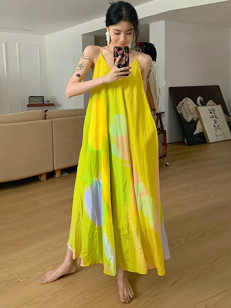 

Clothland Women Elegant Yellow Print Cami Dress Spaghetti Straps Sleeveless Backless A Line Beach Wear Midi Dresses Mujer QC908