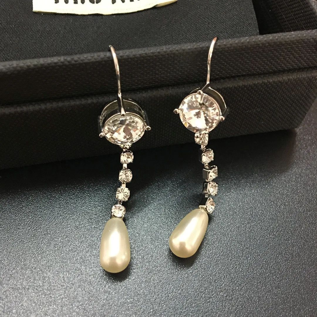 

Жемчужные длинные серьги с кисточками