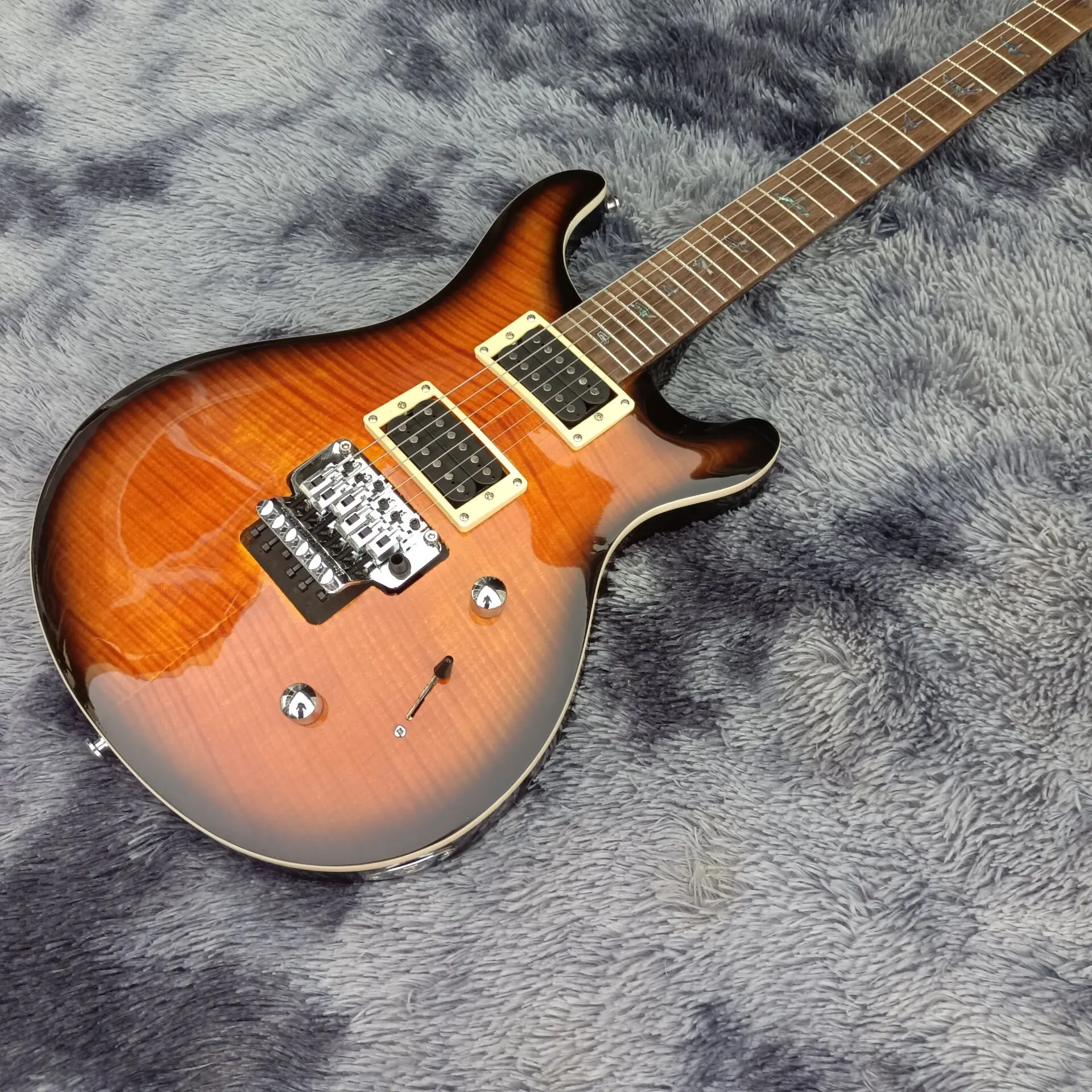 

Classic! 6 string electric guitar, solid mahogany body rosewood fingerboard guitar, real photo