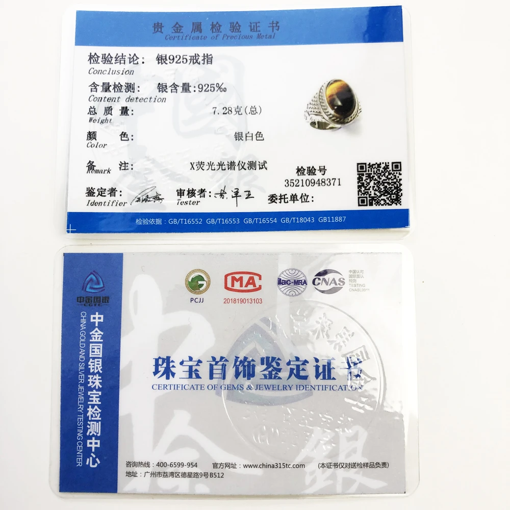 Коктейльное кольцо коричневый тигровый глаз овальный синий камень