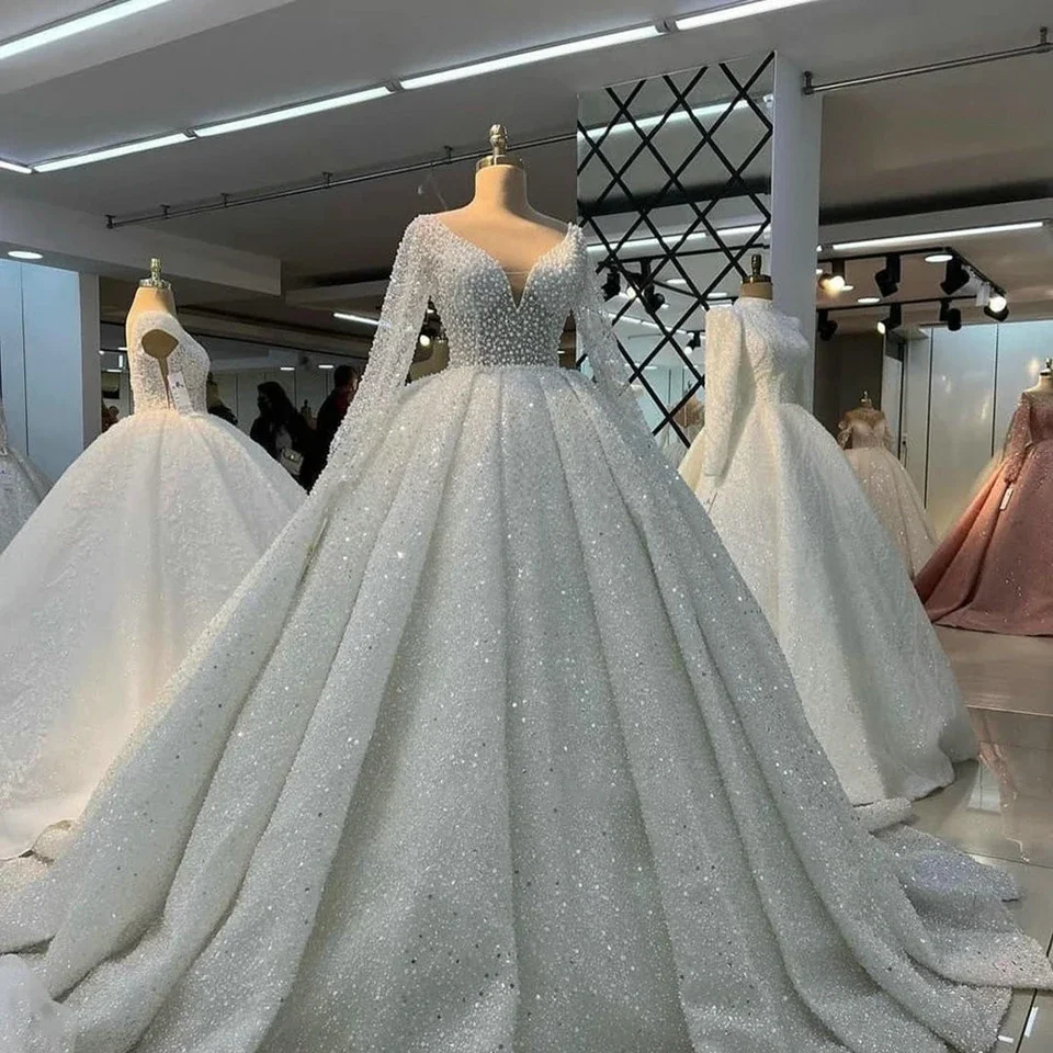 

Luxury Ball Gown V-Neck Wedding Dresses 2024 Arabic Dubai Tulle Pearls Beaded Illusion Long Sleeves Bride Gowns Vestido De Noiva
