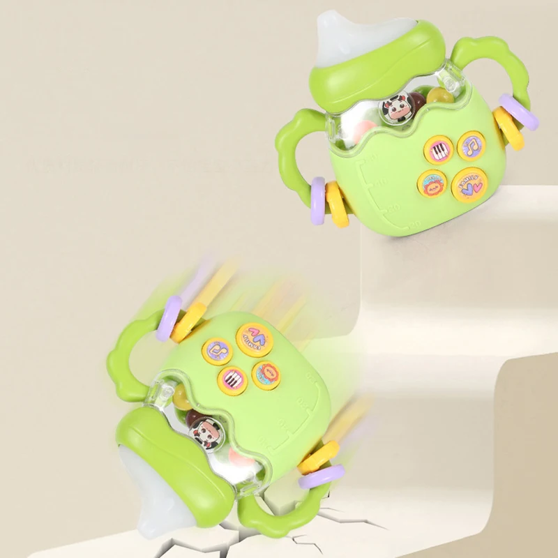 Детская развивающая игрушка-погремушка в виде бутылки