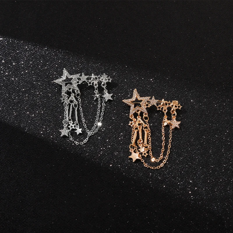 Женская брошь в форме скрипки золотого и серебряного цвета