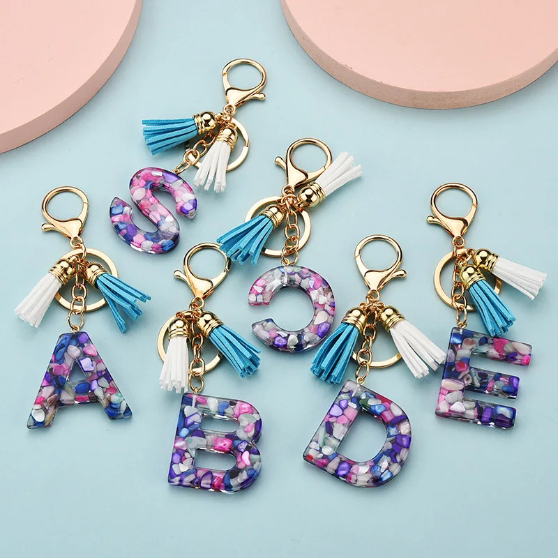 

26 Letter Simulated gemstone Filled Resin Keychains Fashion English Letter Sequin Tassel Keychain Handbag and Car Charm Pendant