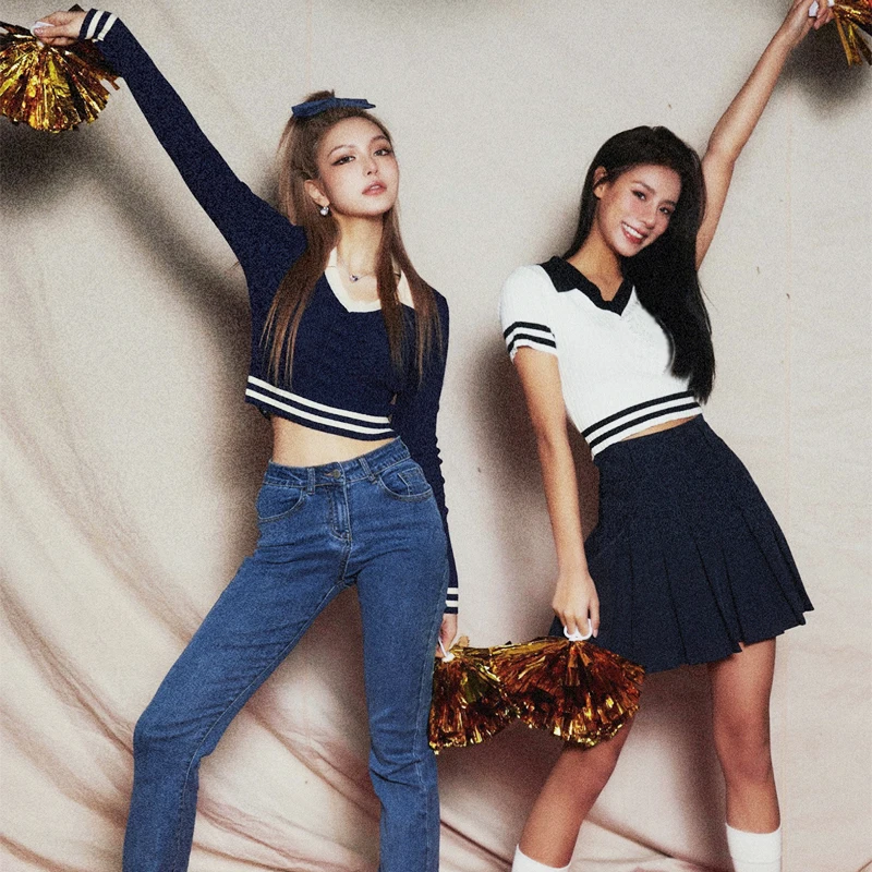 

Женский трикотажный джемпер в рубчик с контрастными полосками