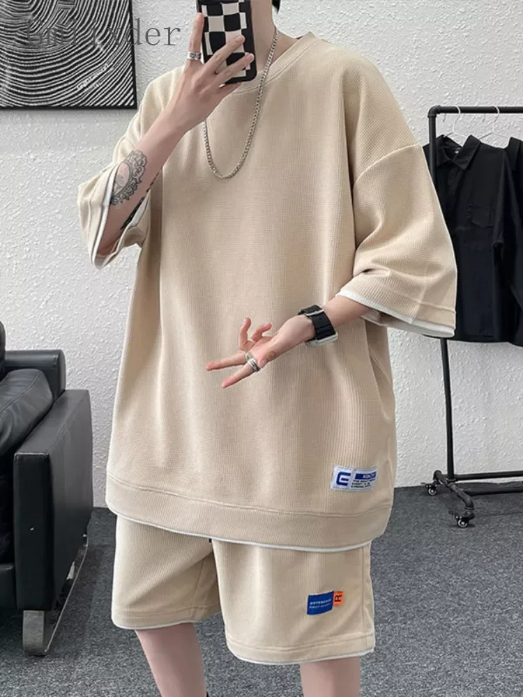 

Новый Повседневный костюм в стиле хип-хоп с вафельным принтом, мужская летняя свободная футболка с круглым вырезом и коротким рукавом и иск...