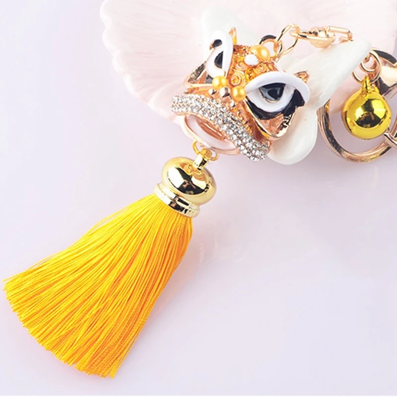 

Chinese Festival Crystal Rotatable Lion Dance Men Car Keychain Lucky Elephant Key Chain Ring Women Bags Holder Charm