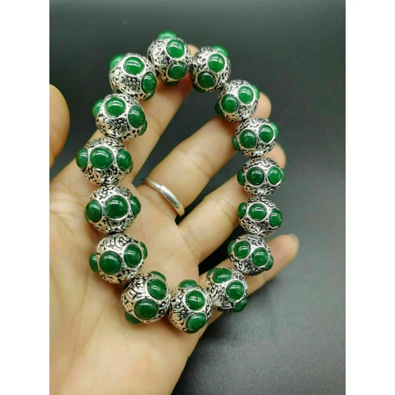 

Браслет из серебра с красным и зеленым нефритом