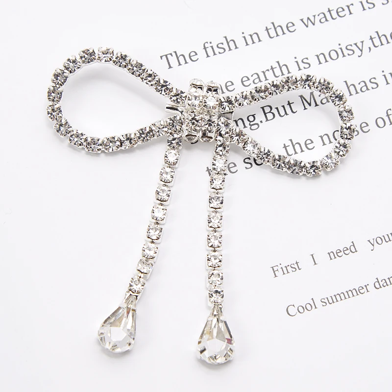 

Romantic Sweet Bow-knot Brooch Women Temperament Crystal Bowknot Brooch Hollow Out Knots Tassel Drop Buckle Brooches Accessories