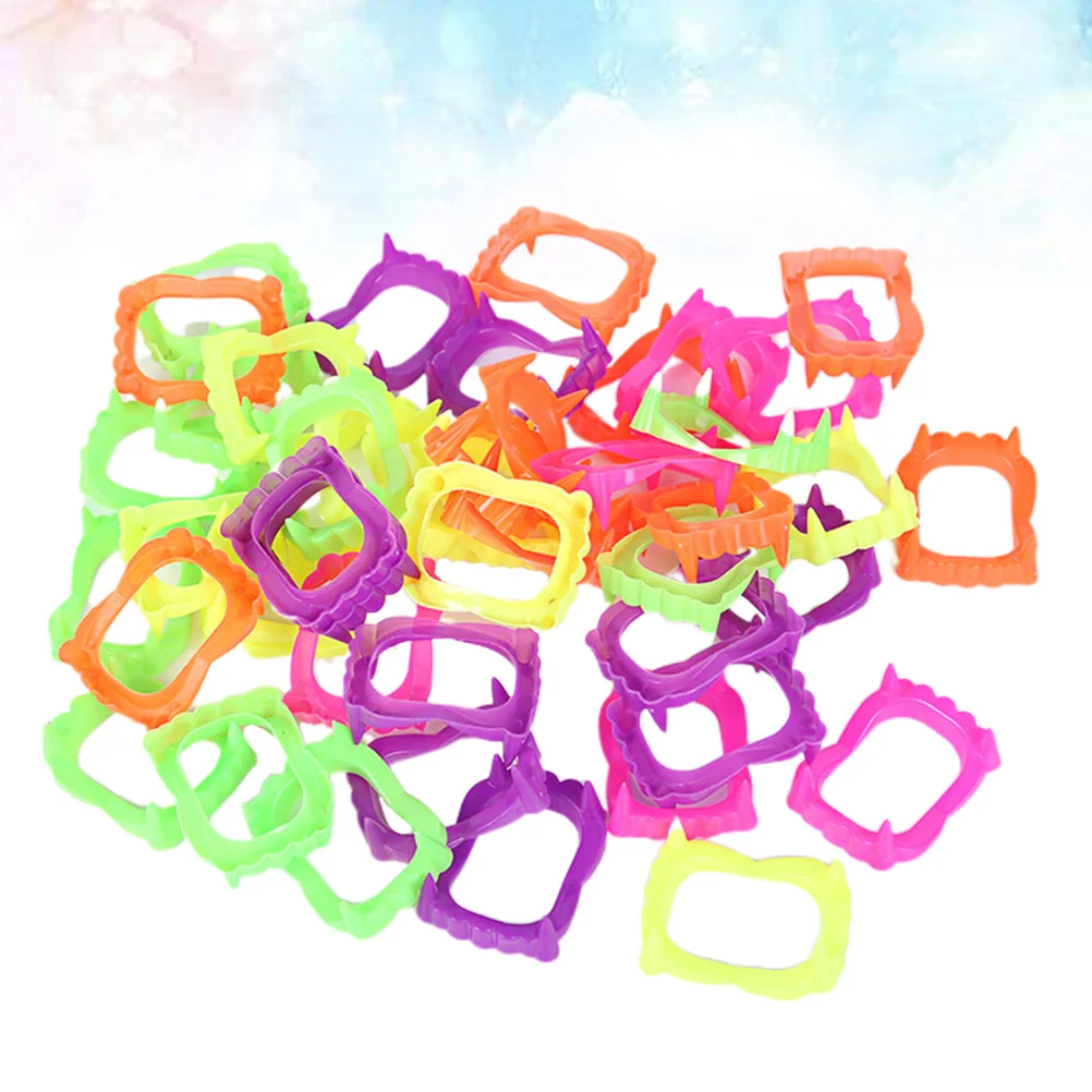 

50pcs Gag Fangs for Costume Party Photos Props ( Mixed Color )
