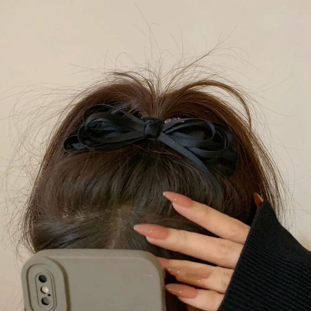 

Женская заколка для волос с черным бантом