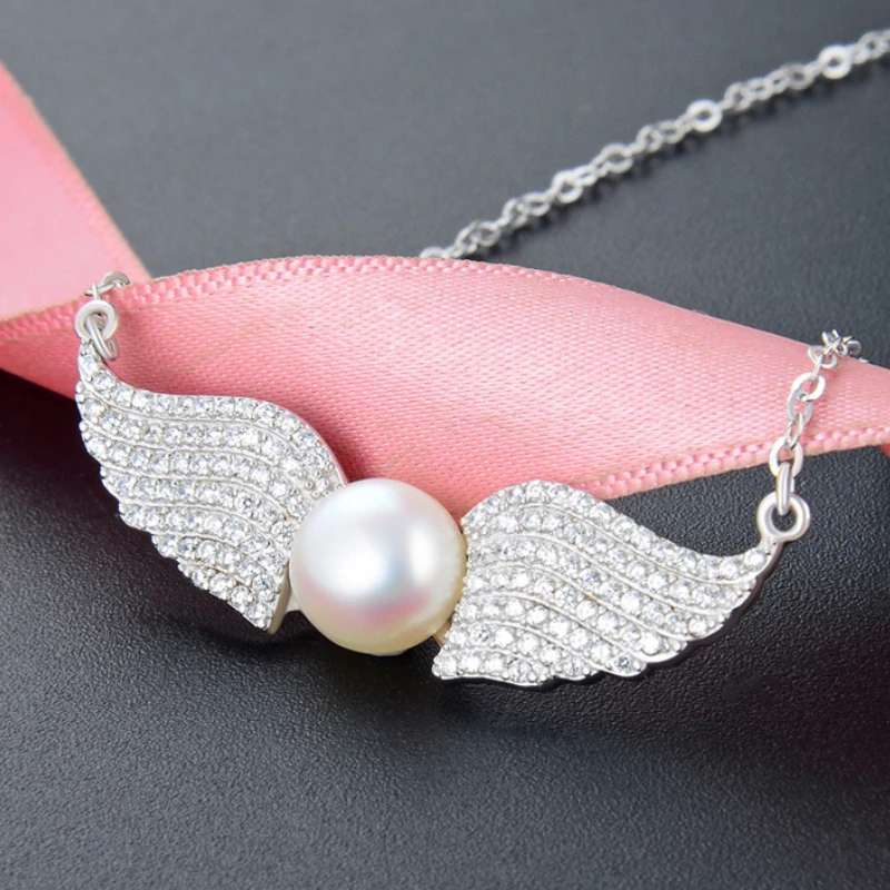 

OL Style Angel Wings Zircon Pendant Pendant S925 Silver Freshwater Pearl Necklace Women Clavicle Chain High Quality Jewelry