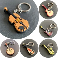 new fashion musical instruments keychain classic guitar pendant key chain silicone key ring car accessories for man women gift