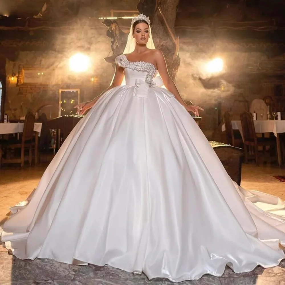 

Элегантное винтажное свадебное платье Doymeny, длинное платье невесты на одно плечо с жемчугом, атласные свадебные платья принцессы с бантом на заказ