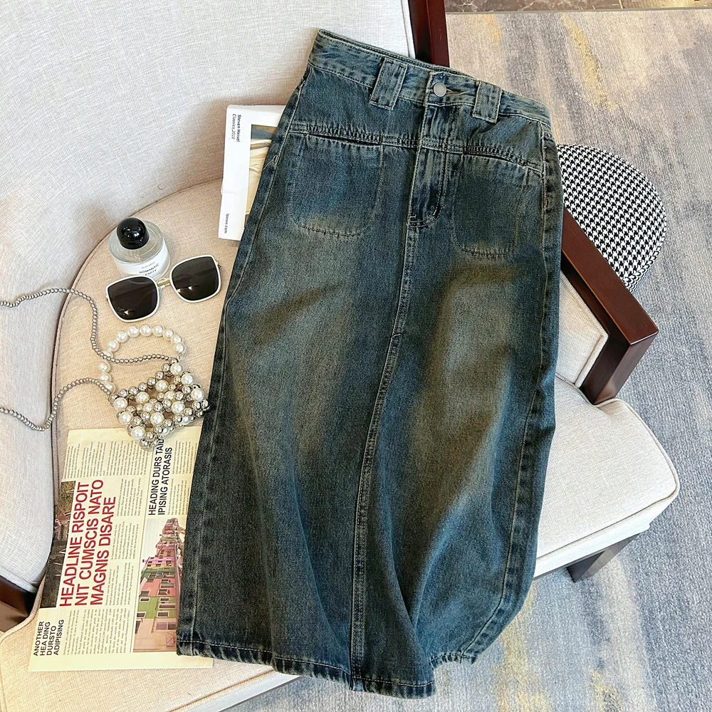 

Женская прямая юбка-трапеция средней длины с карманами и высокой талией