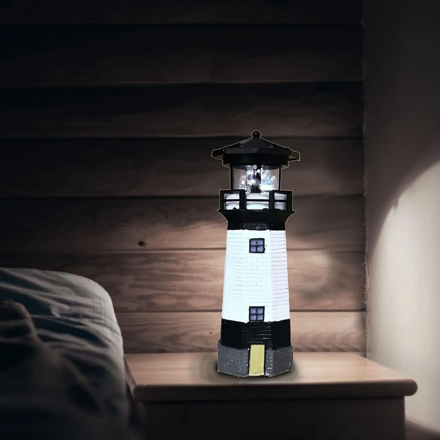 Stylish modern and mesmerizing solar-powered lighthouse to enhance your outdoor space. Illuminate surroundings with warm
