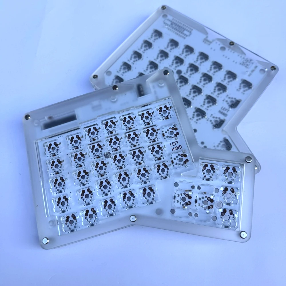 Фото Комплект проводной раздельной клавиатуры Ergodox, изготовленный из акрилового материала, с поддержкой горячей замены, RGB-подсветкой, QMK/VIAL, ортолинейными индикаторами, механическая клавиатура. №1
