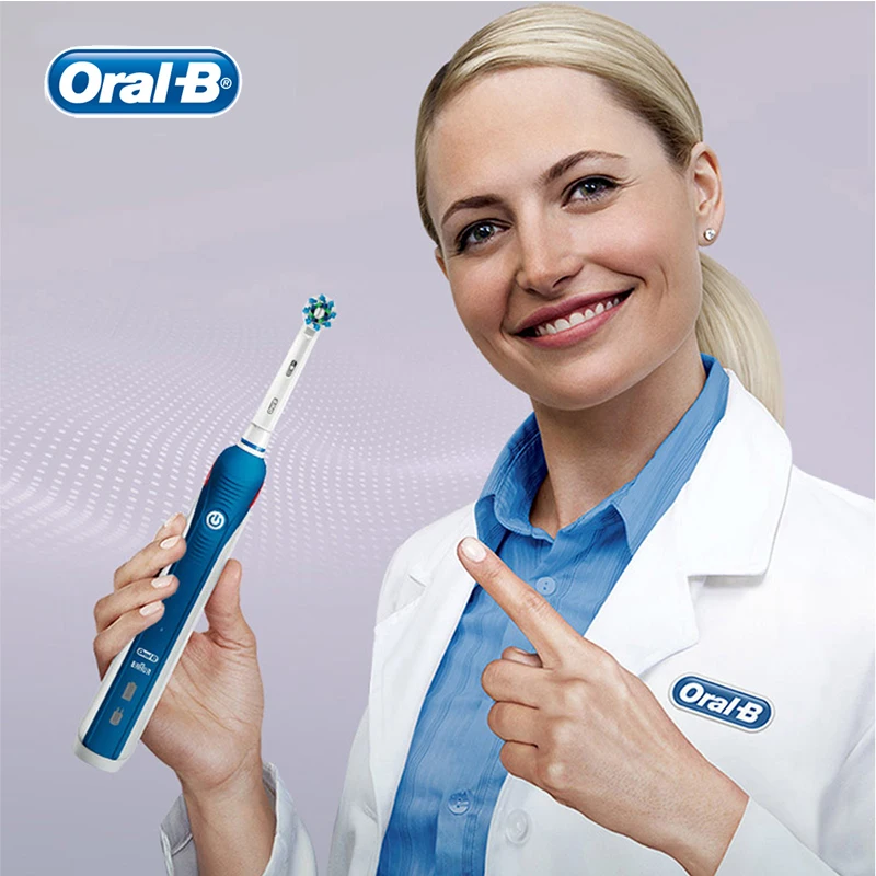 Электрическая зубная щетка Oral-B Pro 4000 с 4 насадками перезаряжаемая для взрослых