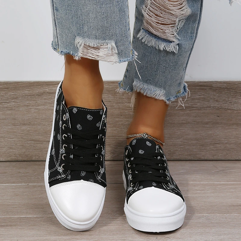 

Женские холщовые туфли на низкой толстой подошве, с принтом