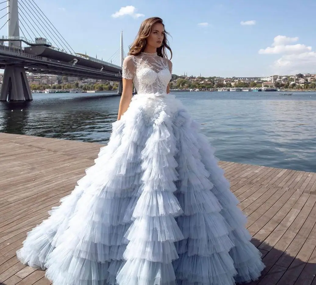 

An Airy Wedding Dress Created By Layers Of Delicate Tulle With A Gradient Effect Blue Tulle Dress With Crystal Beads Prom Gown