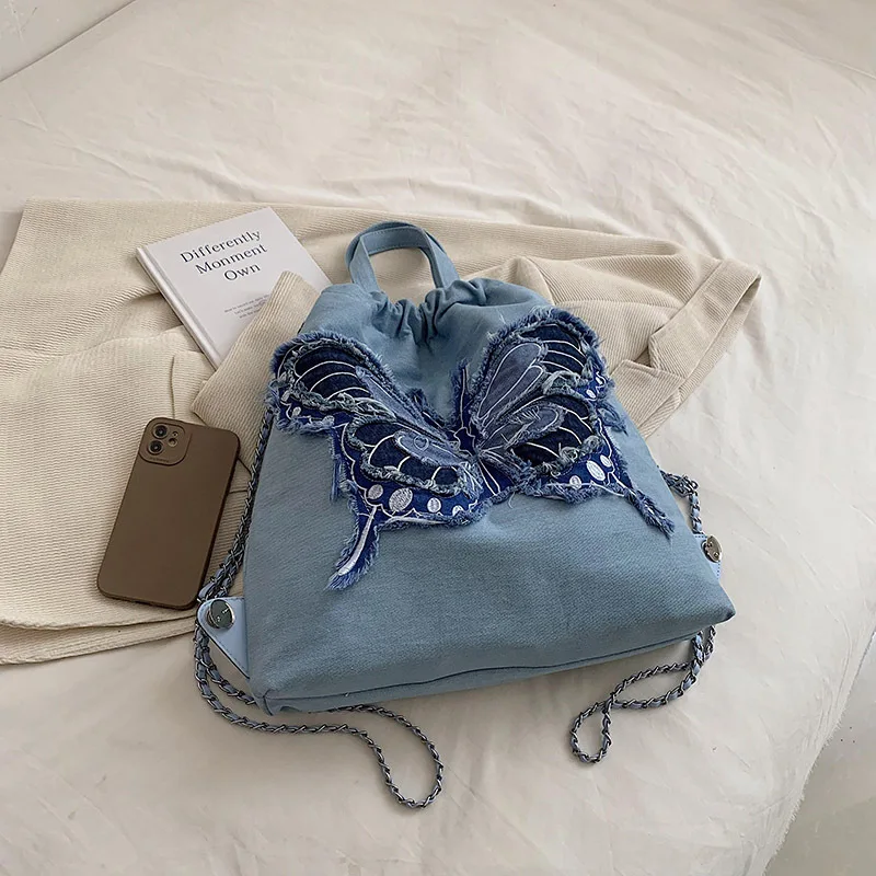 Fashion Denim Women Backpacks Butterfly Designer Backpack Canvas Book Bags for Women 2023 Chains Handbags Drawstring Bags Clutch